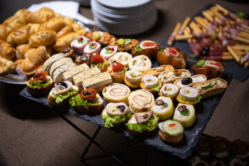 Cattering. Table full of food.