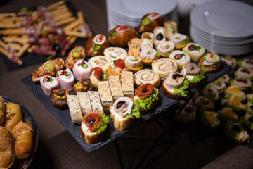 Cattering. Table full of food.
