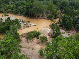 Aerial view a car is trapped during fast flood happen near the river