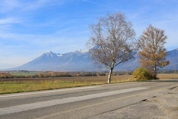 Fototapeta premium Road to the Tatra mountain range in Slovakia.