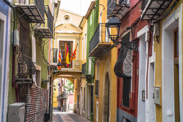 old colorful buildings in the historic center of Villajoyosa. Narrow streets and colorful tenement houses