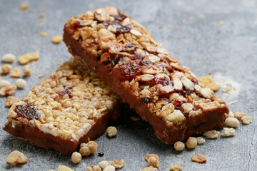 Two muesli bars on the table.