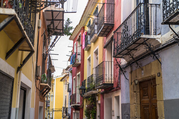 old colorful buildings in the historic center of Villajoyosa. Narrow streets and colorful tenement houses
