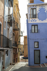 old colorful buildings in the historic center of Villajoyosa. Narrow streets and colorful tenement houses