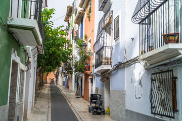 old colorful buildings in the historic center of Villajoyosa. Narrow streets and colorful tenement houses