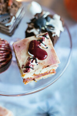 Spooky Halloween cakes. Scary Halloween cakes in selective focus. Preparation for holiday. 