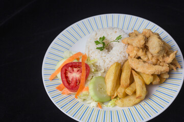 Fried chicken with rice and french fries - Peruvian Food