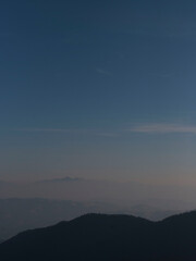 View on mountains in fog and clouds