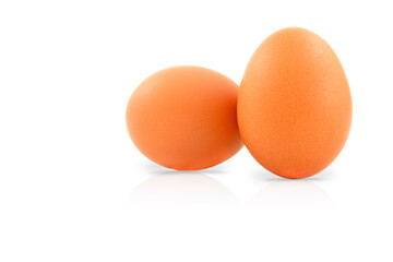 Two fresh eggs isolated on a white background.