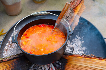 Kettle goulash is prepared over an open fire!
