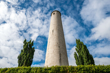 The Round Tower and gravestones in Glasnevin Cemetery, Dublin, Ireland.