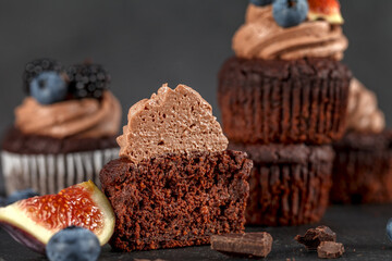 Chocolate cupcakes. Blueberry fig. Half a cream muffin