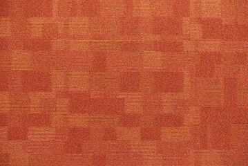 Texture carpet covering, red with a pattern of squares