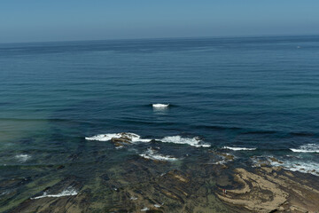 waves breaking on the rocks