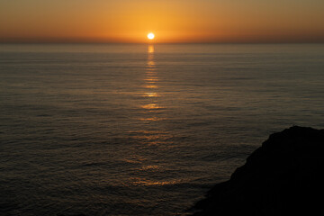 Sun and sea sunset with reflection