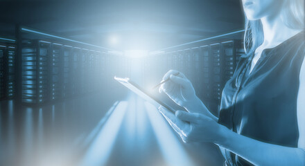 Date science. Woman data processing specialist. Girl with tablet in server room. Servers for storing and processing data. Internet technologies. High tech business. Study big data. Art blurred