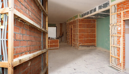Interior of house under construction. Buildings under construction inside view. Unfinished brick building. Renovated building without anyone. Interior of spacious cottage under construction