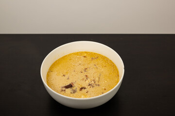 Cheese Burger Soup with ground beef cheese and a white bowl