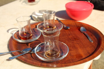 A tiny cup of Turkish black tea in special concept