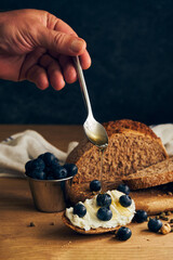 sandwich with cream cheese and berries