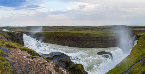 Picturesque full of water big waterfall Gullfoss autumn view, southwest Iceland.