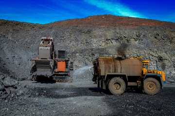 Extraction of iron ore by heavy equipment in the quarry of the Central Mining and Processing Plant