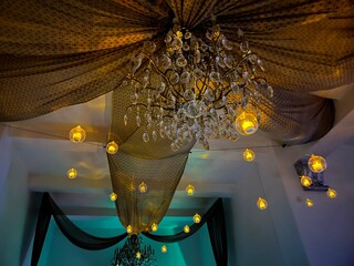 chandelier with golden lights floating