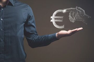 The hand clicks on the Euro from the net.