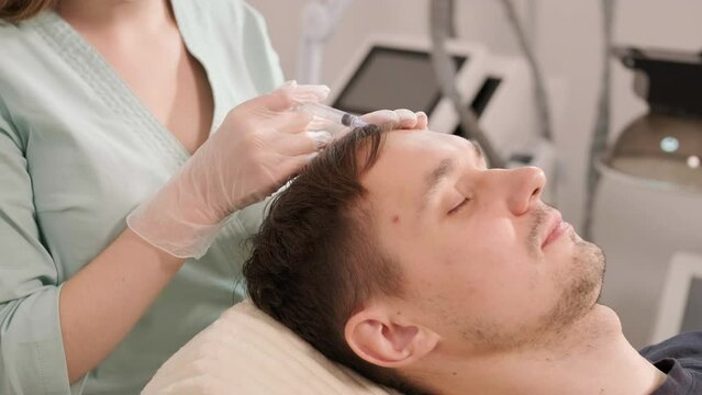 Hair mesotherapy procedure in the modern cosmetology clinic