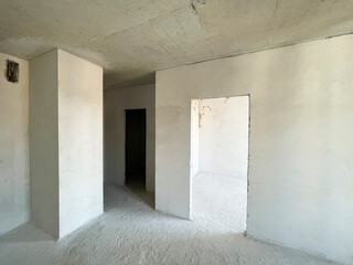 Interior of the apartment without decoration in gray colors