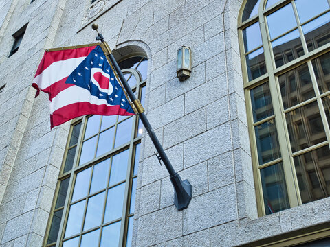 state of Ohio flag on commercial building