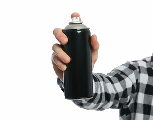 Man holding black can of spray paint on white background, closeup