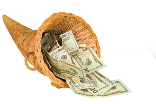 Isolated cornucopia filled with overflowing cash