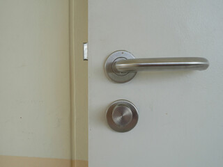 stainless door knob or handle and key hole.	
