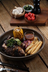 Barbeque grilled ribs served on a neatly arranged plate