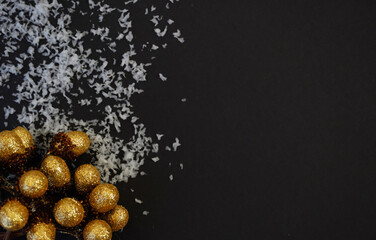      ..beautiful black christmas background for postcards, flyers, banners. Christmas tree branch and Christmas balls and toys