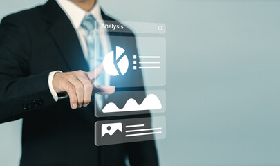 Businessman finger touch virtual screen with stock market analysis, Financial data analytic concept. Artificial intelligence data analytic technology, Financial and business investment background.