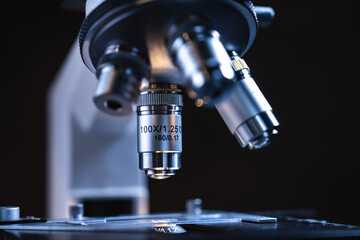 professional scientific equipment microscope for medicine scientist using in biotechnology science laboratory, biology or chemistry and medical technology research with microbiology experiment