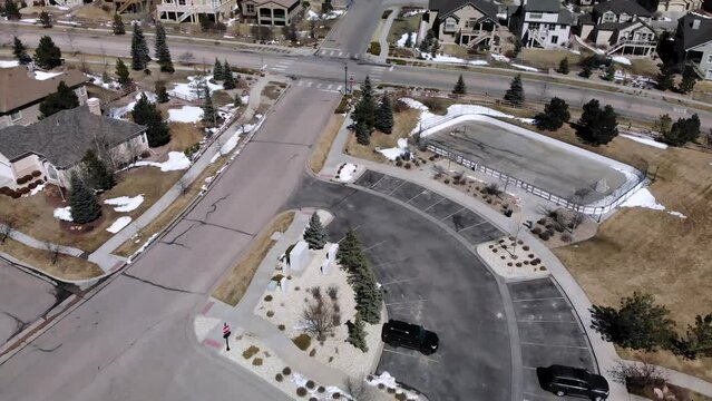 Hockey Rink and Park Next to Neighborhood • Aerial Drone Push Out Reveal Video • Midwest American Architecture • HD Footage Shot in Horizontal