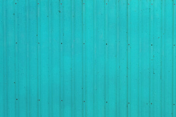 Fototapeta na wymiar Close up of blue metal sheet part of a roof 