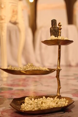 a copper stand to keep the flowers