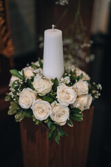 Wedding decoration indoors. Cathedral, church decoration for ceremonial wedding. Grooms and Bride