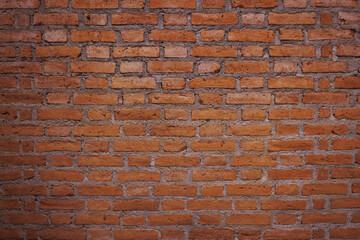 Old red brick wall pattern background. Vintage look of brick surface texture from brickwork. It can be use as wallpaper.