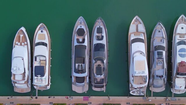 luxury yachts park in the harbor.
Unbelievable aerial view flight vertical 9:16 bird's eye view drone
at ibiza town port October 2022. 4k marnitz cinematic