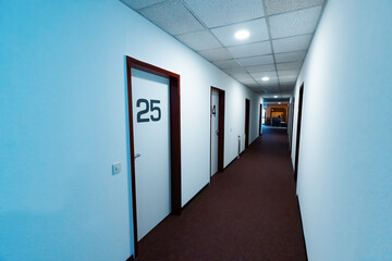 The number on the door in an unrecognizable hotel or hostel. Modern and stylish interior design