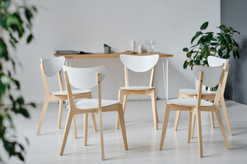 Horizontal image of empty class for psychotherapy session with chairs for patients
