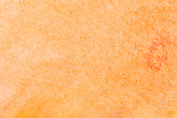 Orange abstract watercolor paper background.