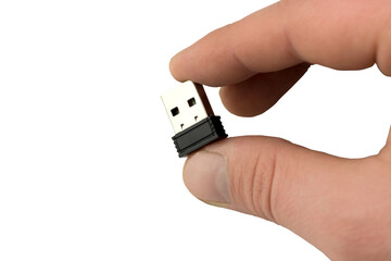 small flash drive in hand close-up. Isolate, transparent background