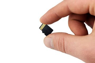 micro sd card in hand, isolate. Close-up