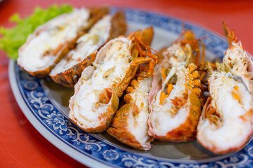 Seafood steamed lobster in vegetable decoration